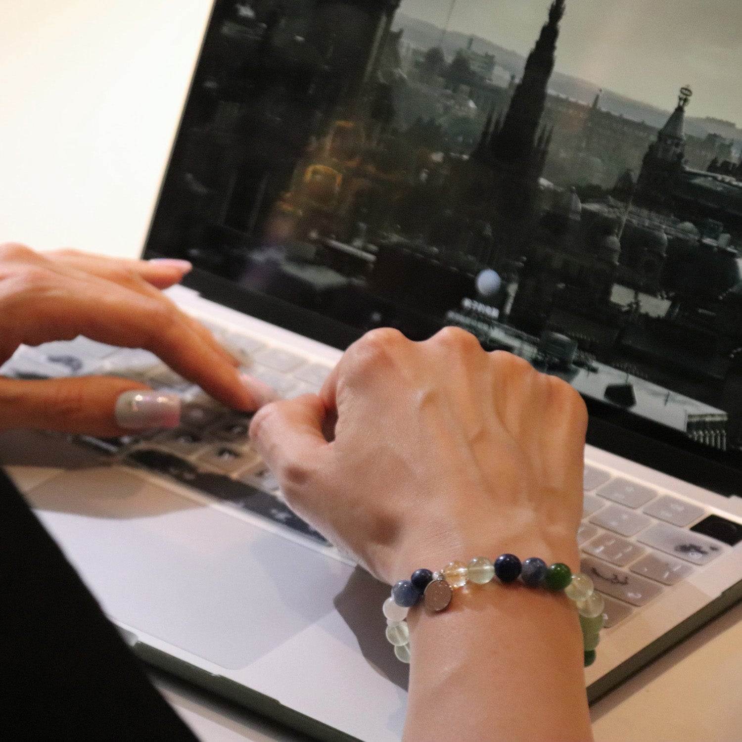 Woman wearing Pleiades bracelet for social confidence and connection