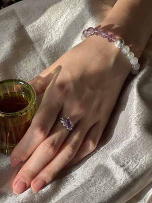 Full Moon crystal bracelet worn on wrist, soft-toned jewellery for everyday elegance