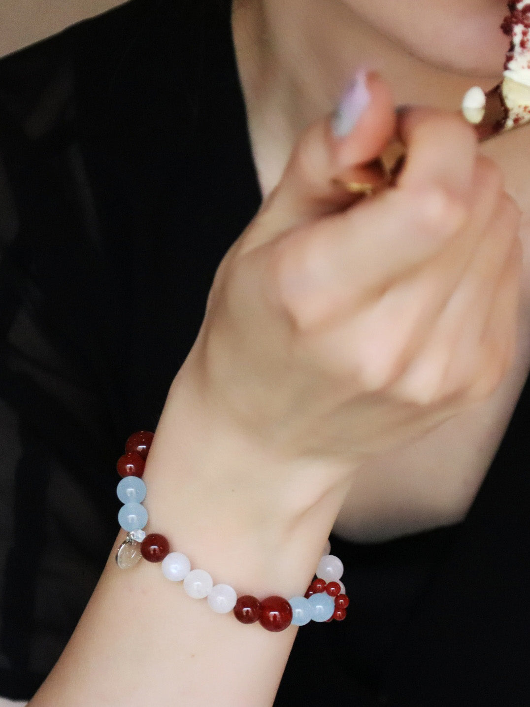 Close-up of natural crystal bracelet with agete and moonstone