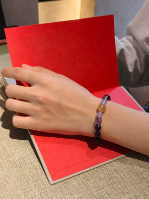 Man wearing amethyst crystal bracelet for clear thinking and focus