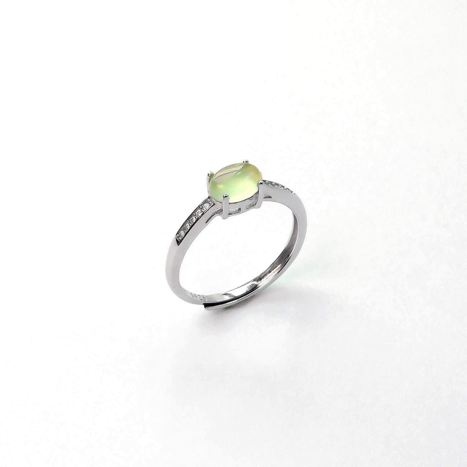 Prehnite sterling silver ring offering calm during stressful work or commuting