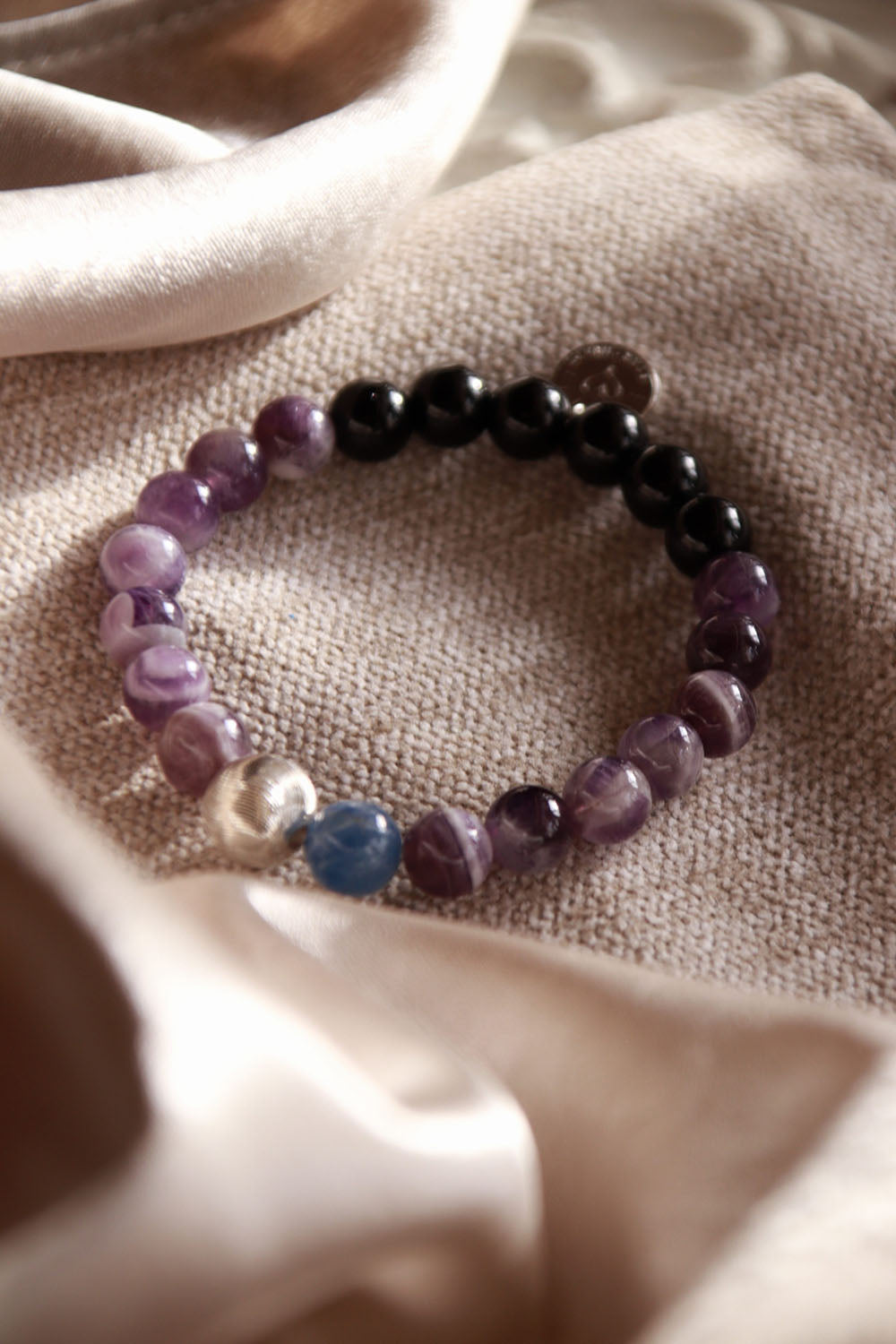 Amethyst and kyanite Waning Gibbous moon phase bracelet, handcrafted gemstone piece